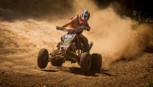 Person Riding On Black Atv Quad Bike photo