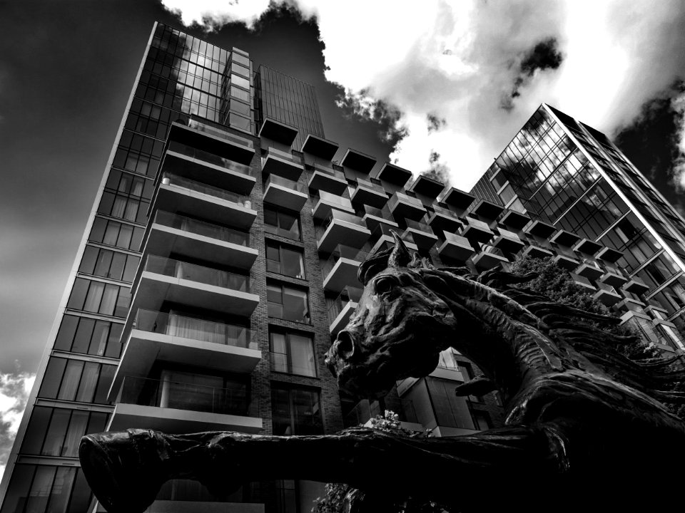 Worms Eye View Photography Of Horse And Building