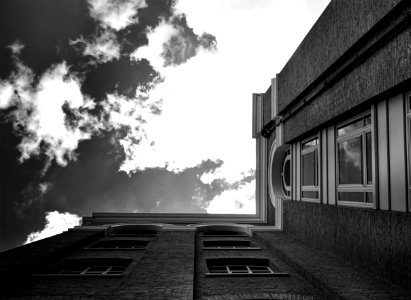 Grayscale Photography Of Low Angle Building photo