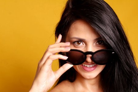Smiling Woman Wearing Black Sunglasses photo