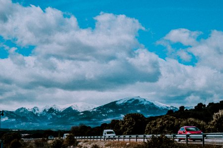 Vehicles Passing By Mountain