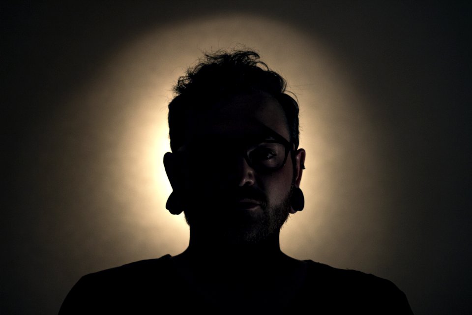 Man Wearing Black Shirt And Black Framed Eyeglasses photo