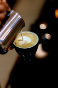 Close-up Photography Of Latte Art Making photo