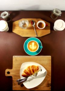 Flat Lay Food Photography Of Plate Of Croissant photo