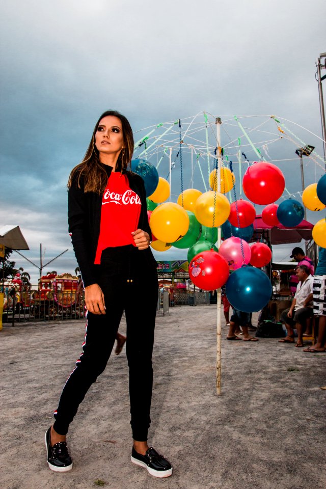 Woman Standing Near Hanging Balls