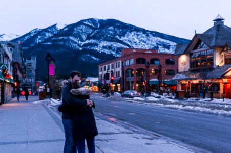 Man Hugging Woman On Street