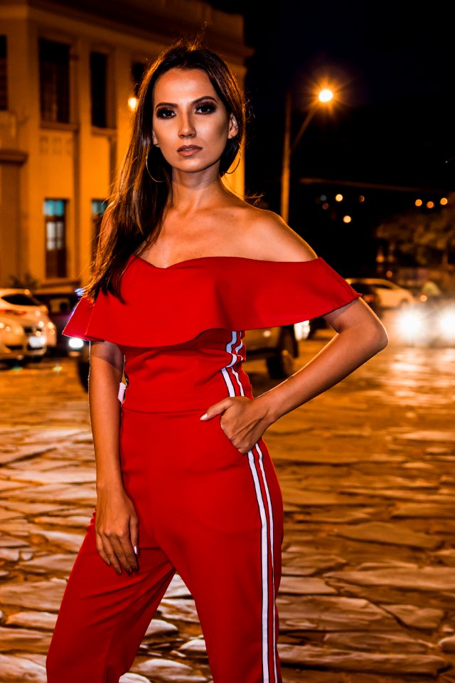 Woman Wearing Red Jumpsuit