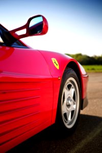 Photo Of Red Ferrari Sports Car photo