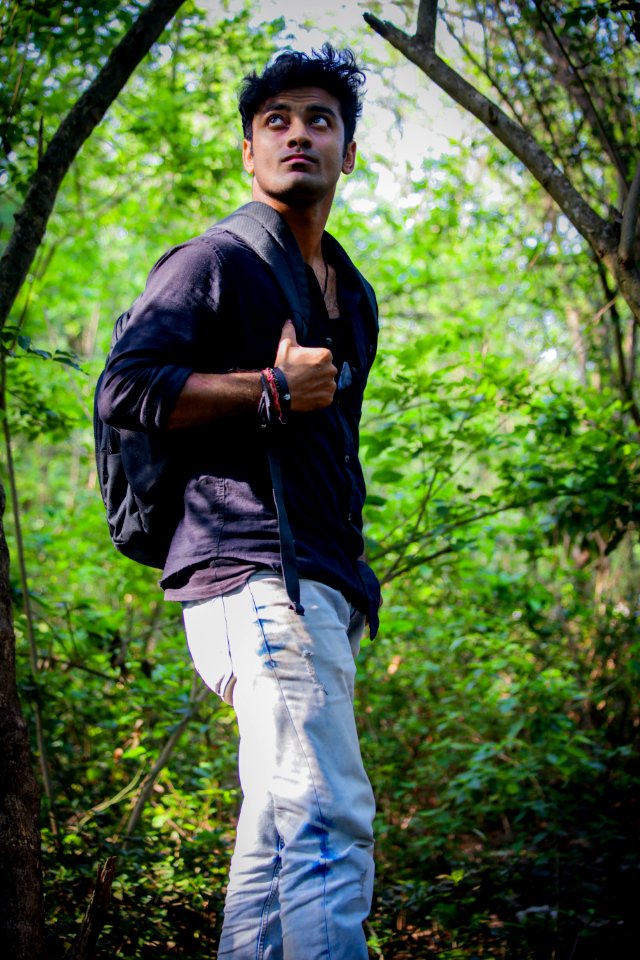 Man Wearing Long-sleeved Shirt And Blue Denim Jeans