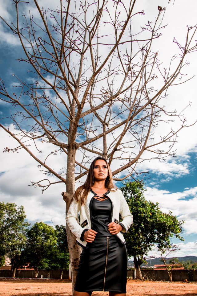 Photo Of Woman Standing Near Tree