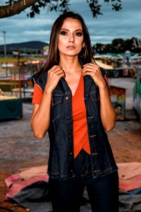 Woman In Orange V-neck T-shirt photo