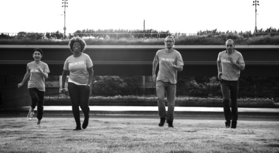 Four People Running