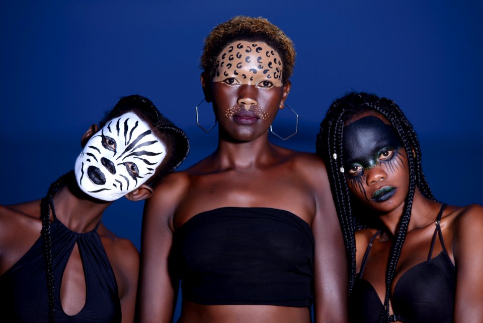 Three Women With Animal Face Makeups