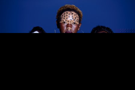Three Women With Animal Face Makeups