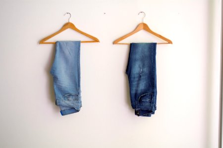 Two Hanged Blue Stonewash And Blue Jeans photo