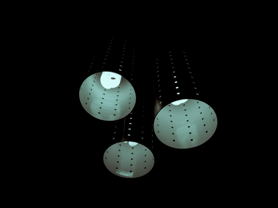 Photography Of Three Lamps On Dark Room