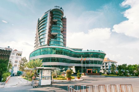 High Rise Building With Green Glass Windows photo