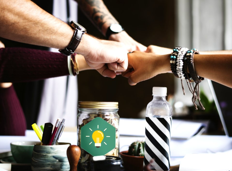 Group Of People Putting Fist On Center