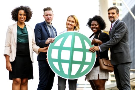 Five Men And Women Holding Logo