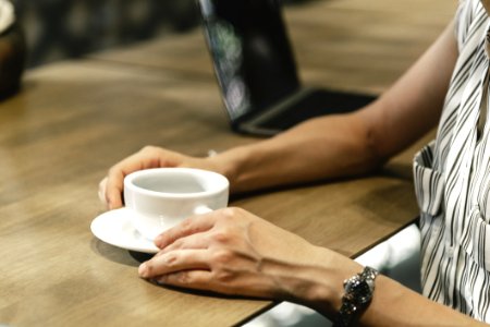 Person Holding Teacup