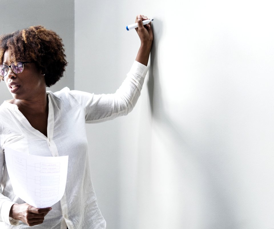 Woman In White Dress Shirt Holding Blue Permanent Marker