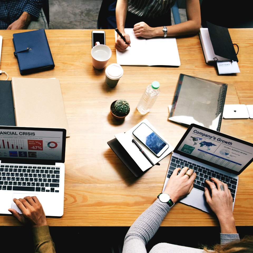 People Working At The Office Desk