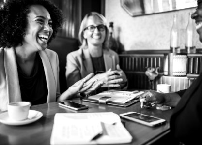 Grayscale Photo Of Smiling Women photo