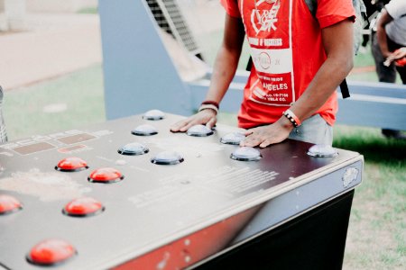 Person Wearing Red And White T-shirt