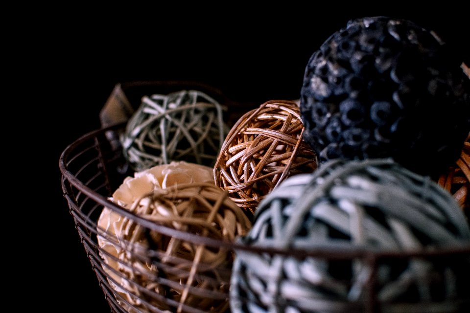 Brown And Gray Vine Balls On Brown Metal Rack