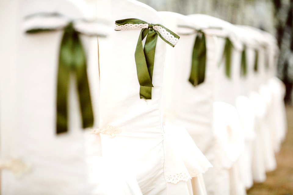 Selective Focus Photography Of White Padded Chair photo