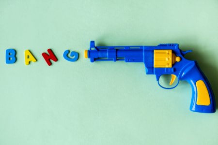 Blue And Yellow Plastic Toy Revolver Pistol photo
