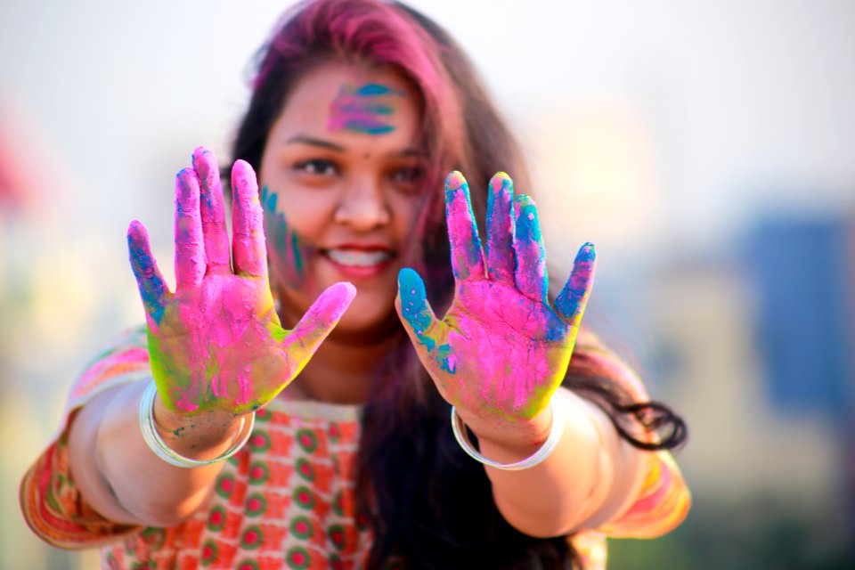 Woman Showing Her Hands With Assorted Color Paints