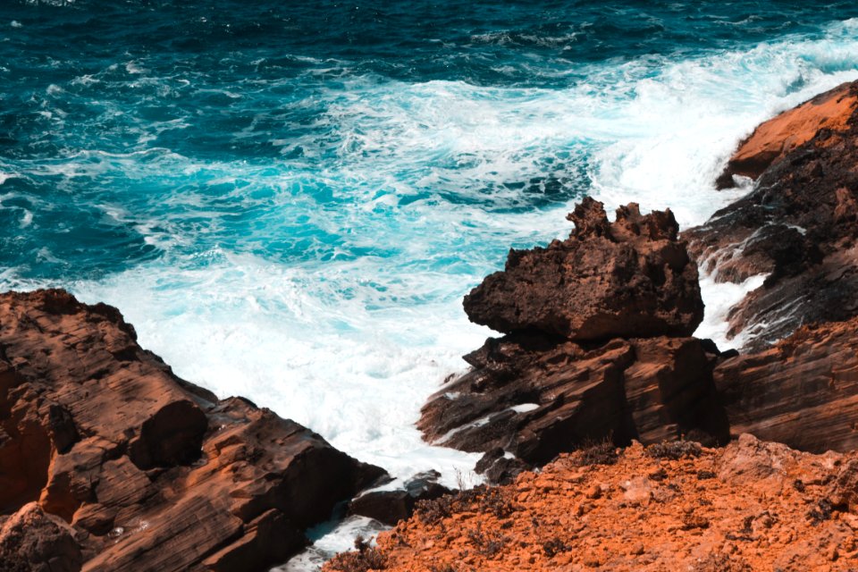 Photo Of Rocks Formation On Seashore