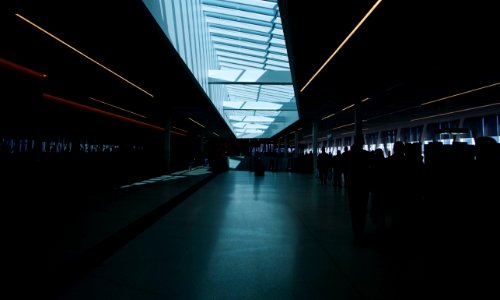 People Walking On Hallway photo