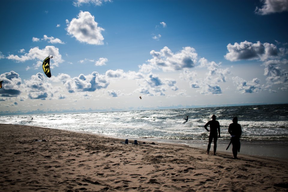 People Standing At Beach