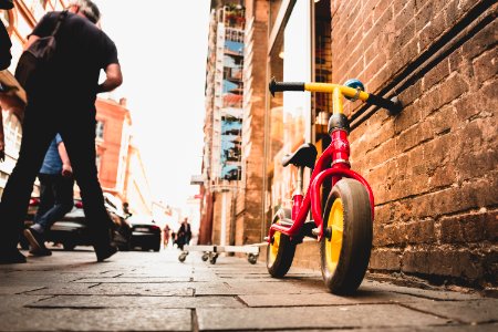 Bicycle Leaning On Brick Wall photo