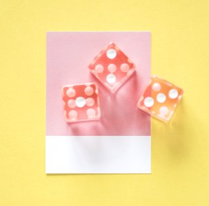 Closeup Of Dice On A Small Paper photo