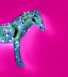 Aerial View Of Horse Figurine Toy With Negative Effects In A Col