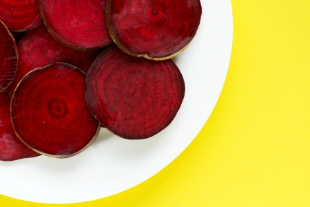Round Textured Slices Of Beetroot On A Plate
