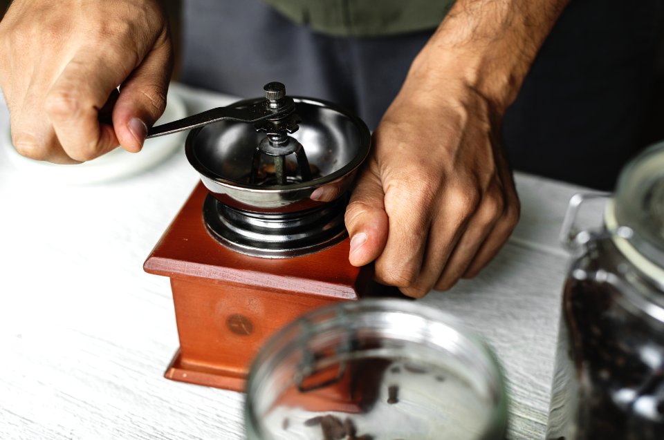 Person Holds Brown And Black Hand Tool