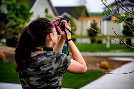 Woman Wearing Camouflage Scoop-neck Shirt