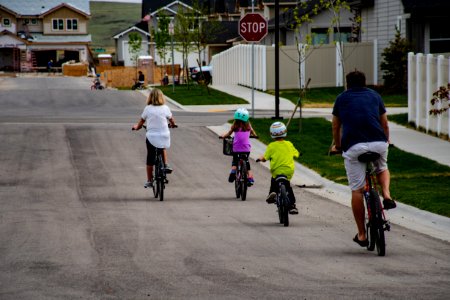 Family Riding On Bicycle photo