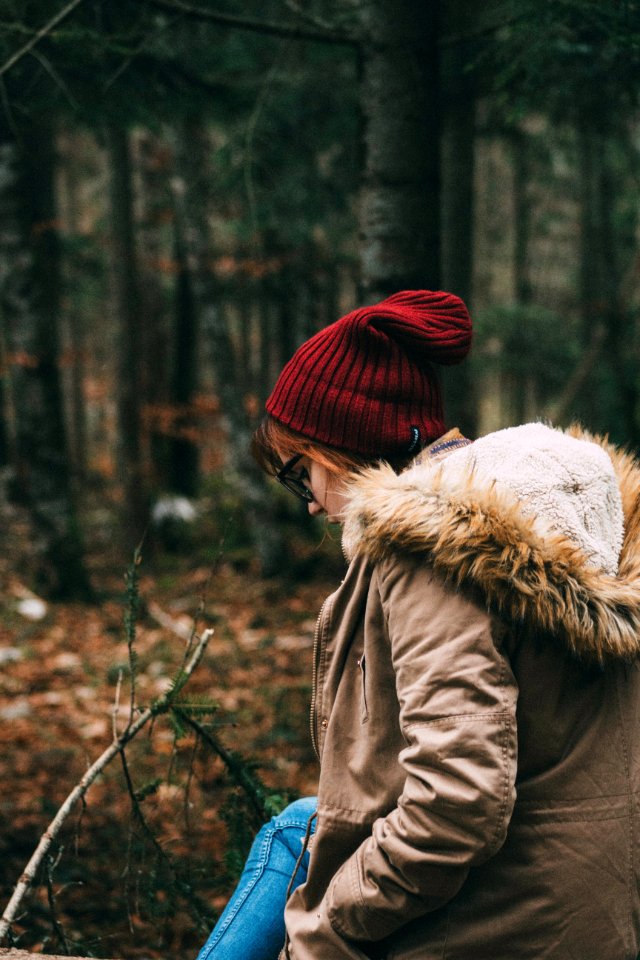 Woman Wearing Red Knit Beanie