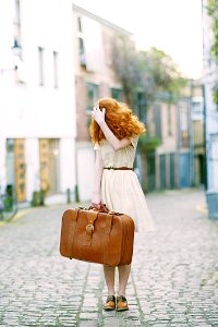 Woman In White Short-sleeved Dress Holding Brown Leather Suitcase photo