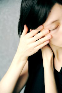 Woman Holding Her Hair