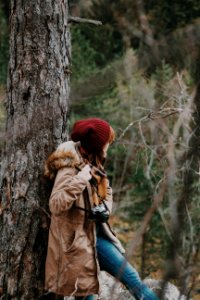 Woman Wearing Maroon Knitted Hat