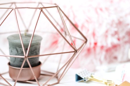 Selective Focus Photography Of Candle In Pink Ornate Holder photo