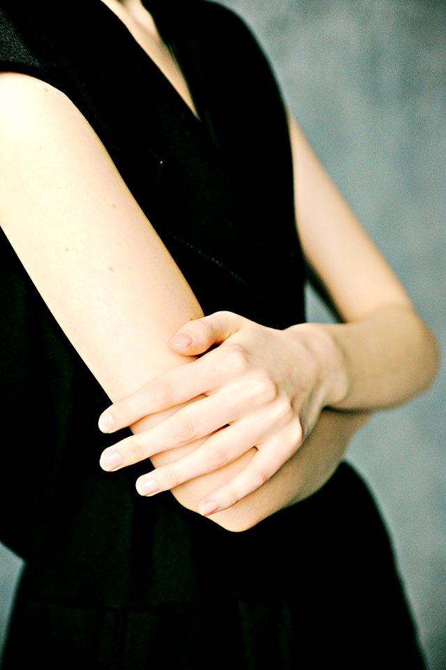 Woman In Black Sleeveless Dress
