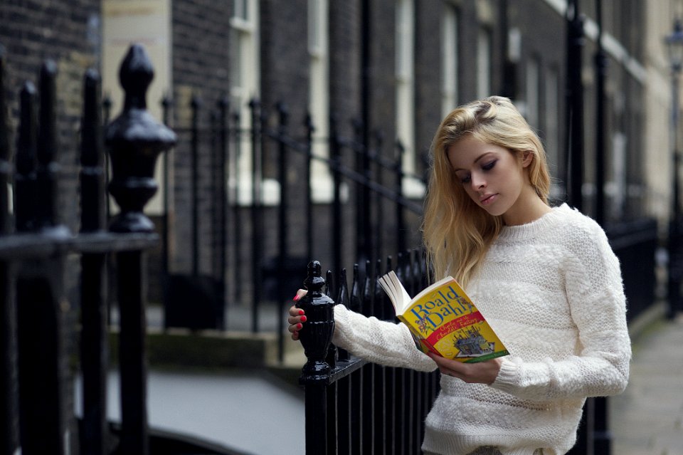 Woman Reading Boald Dahla Book