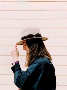 Side View Photography Of A Woman Wearing Fedora photo